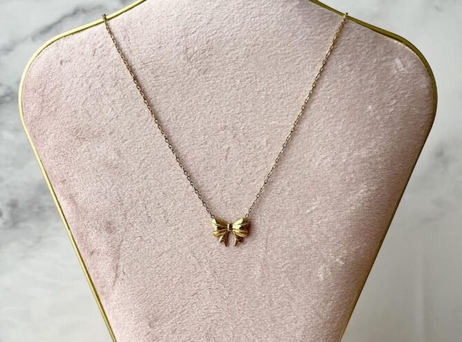 collana in acciaio fiocco oro collana in acciaio fiocco oro